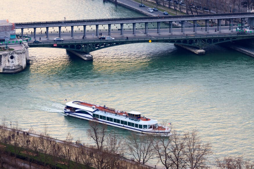 View of a boat on the Seine River in Paris from the Eiffel Tower