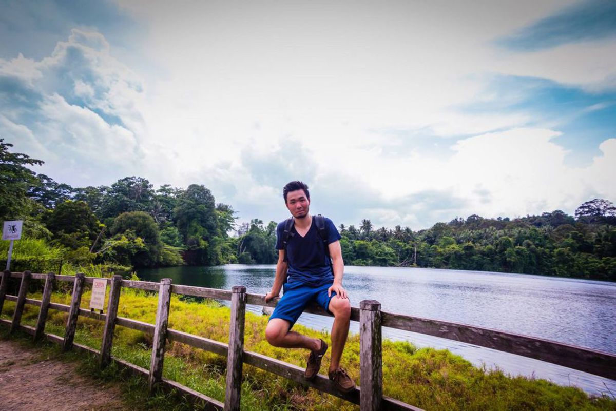 A person sitting at Pulau Ubin in Singapore