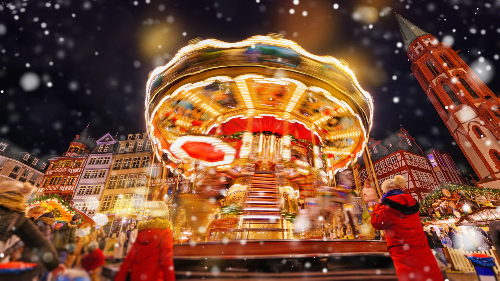 An illuminated carousel at the Christmas Market in Frankfurt.