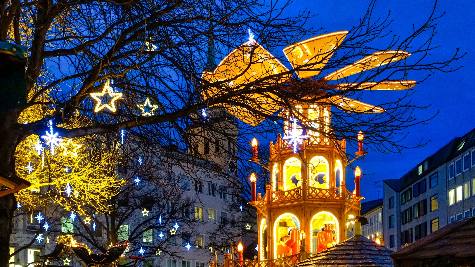 A wooden carousel at a Christmas market in Munich.