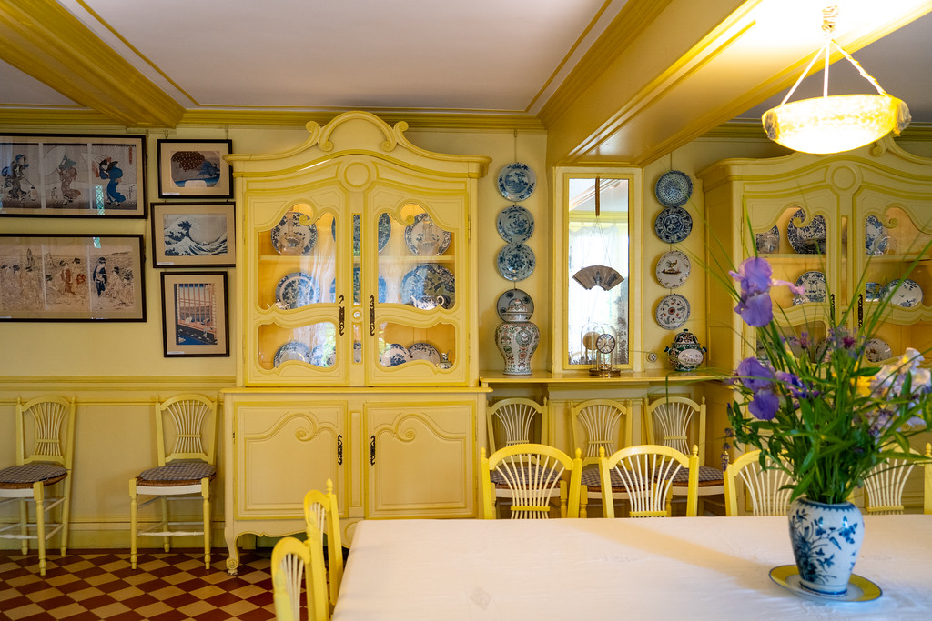 Yellow dining room inside Monet's House in Giverny