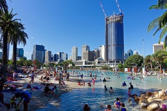 Artificial beach with city skyline in Brisbane, Australia