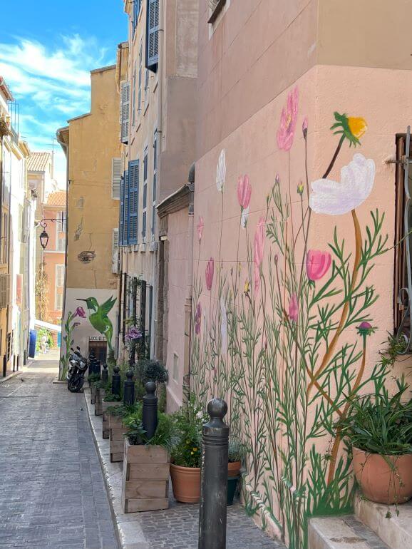 Floral mural on a building in Le Panier district of Marseille, France