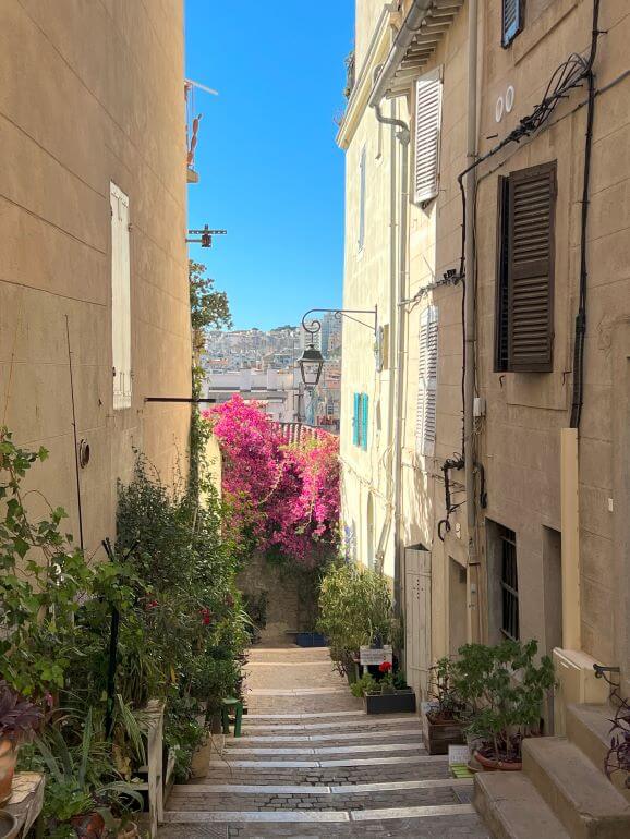 Looking down a side alley in Le Panier district of Marseille, France