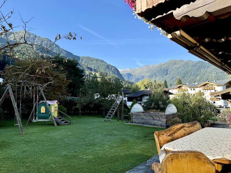 View into the garden of Koller bed and breakfast and towards the Kitzsteinhorn mountain...