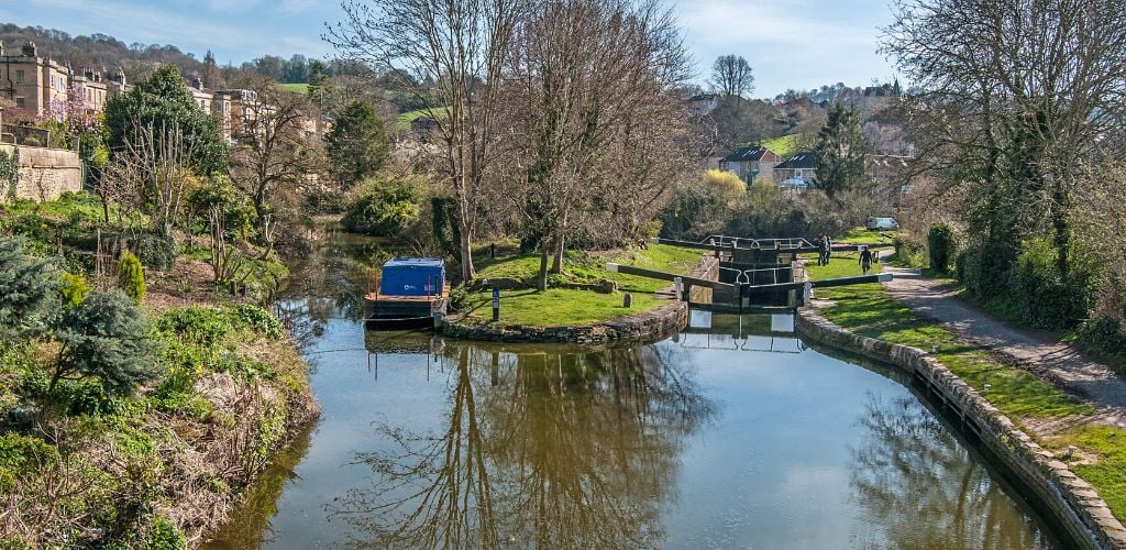 A picturesque canal walkway in Bath.