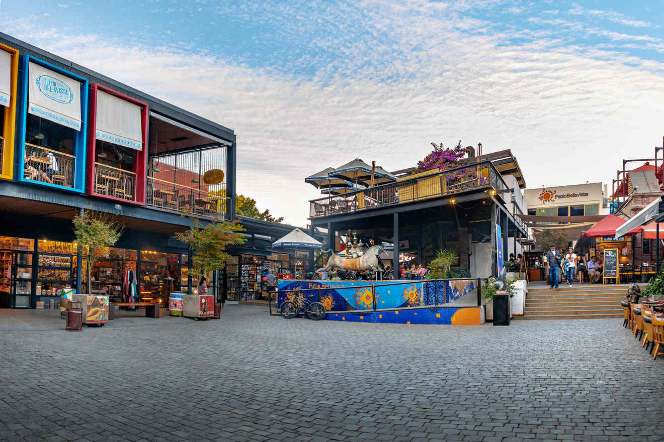 Vibrant, colorful shops and restaurants in Patio Bellavista, a lively shopping and dining area in Santiago de Chile.