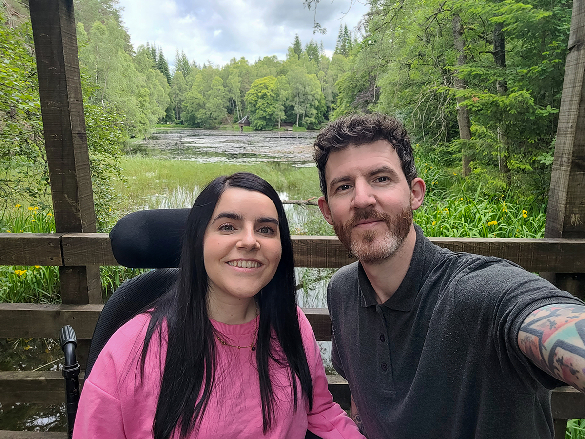 Selfie of Emma and Allan on the wooden bridge in Faskally Woods.