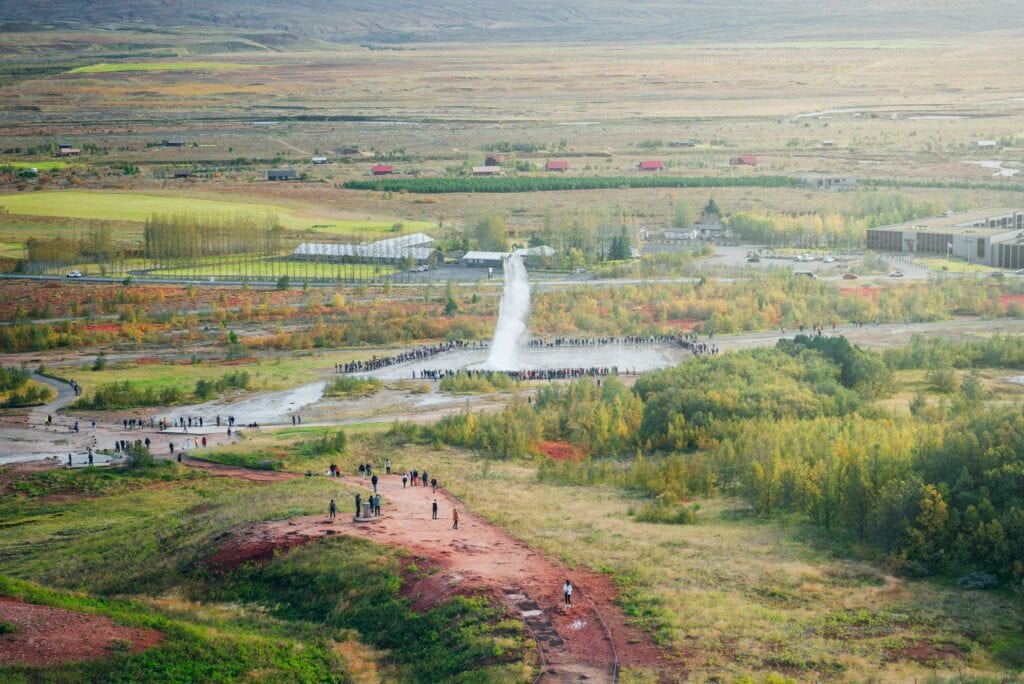 A panoramic view of the Haukadalur valley with erupting geysers in the Golden Circle.