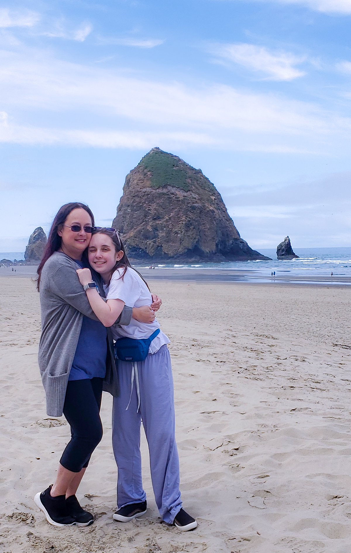 Family in Front of Haystack Rock