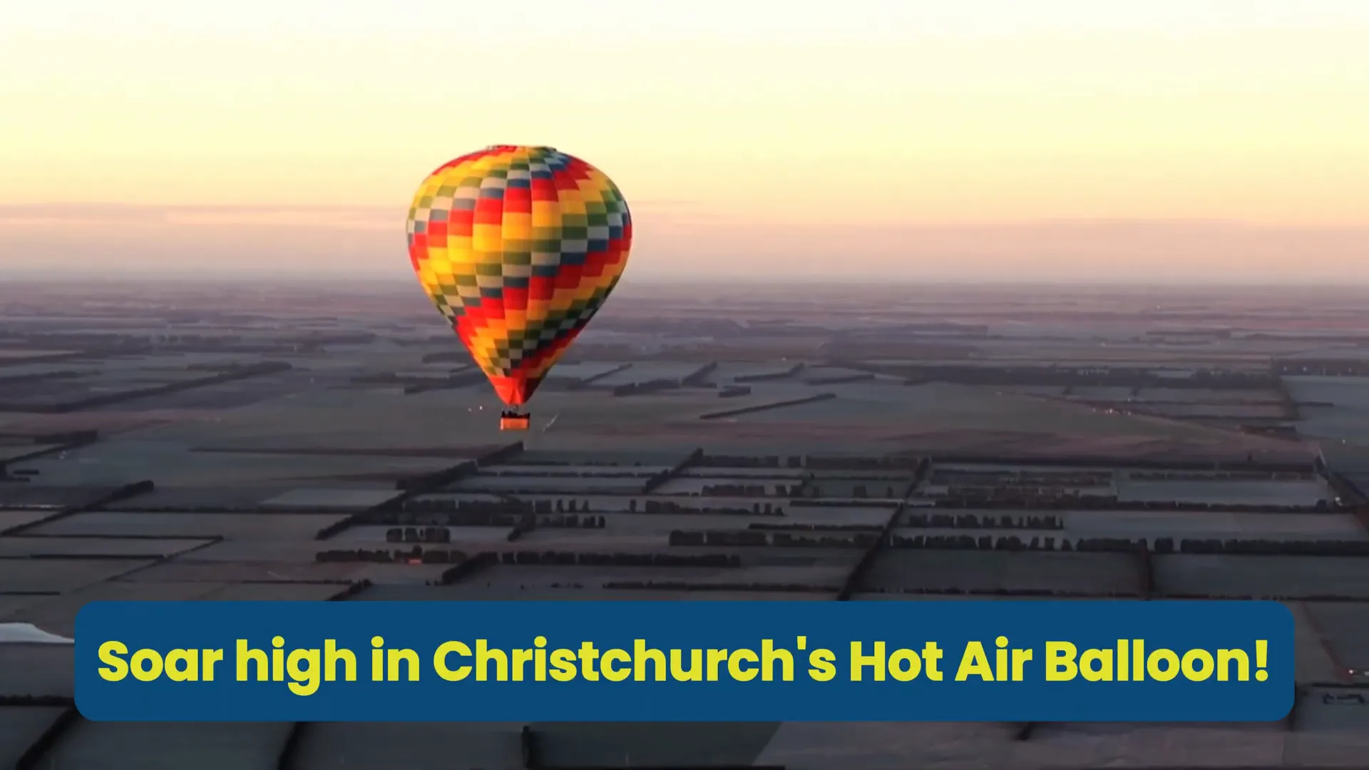 Hot air balloon soaring over Canterbury at sunrise