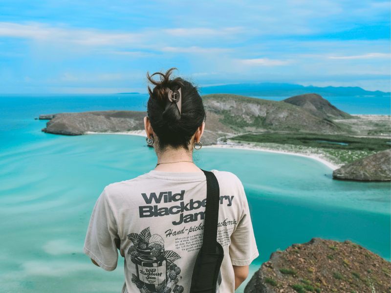 Woman hiking at Playa Balandra Beach, La Paz, Mexico