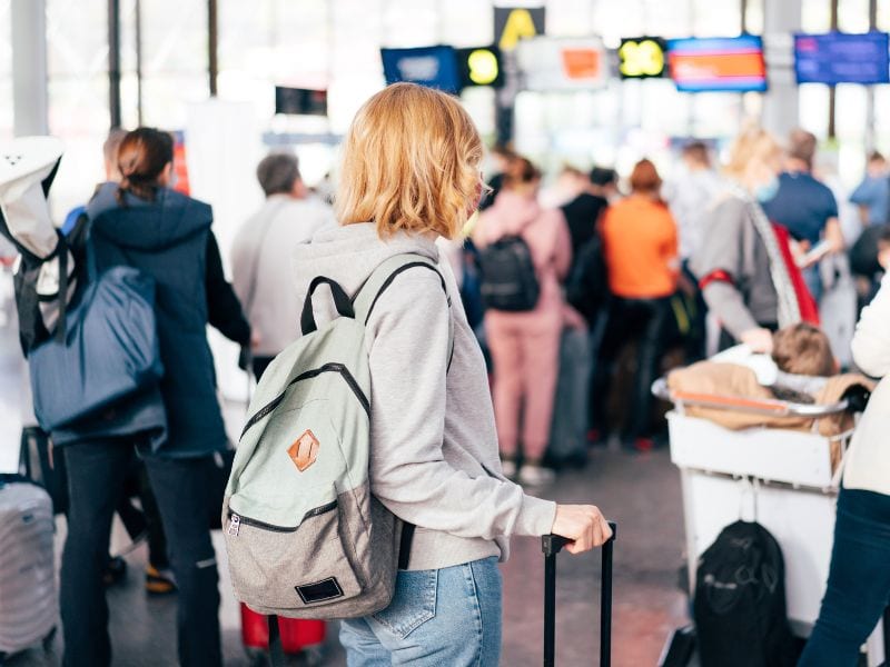 Woman in a crowded airport