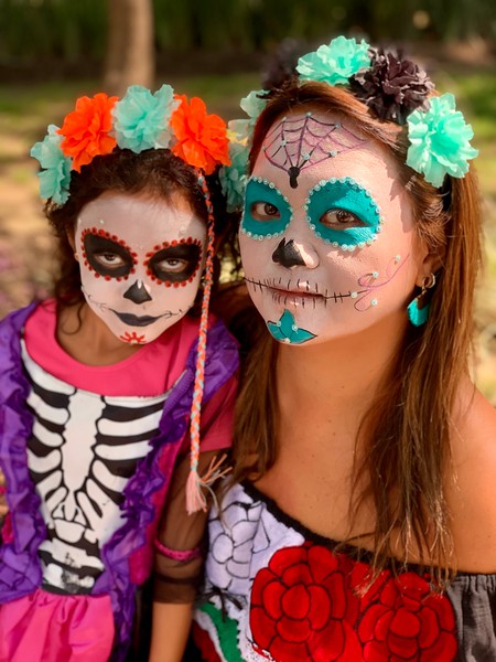 skull face painting at dia de muertos