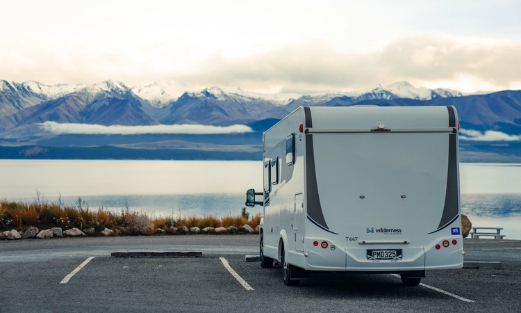 A Wilderness motorhome parked at a designated parking spot