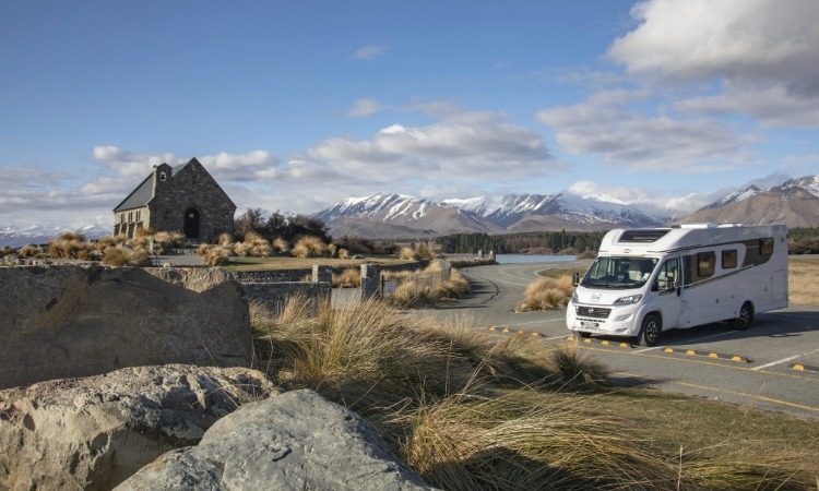 A motorhome parked near the Church of the Good Shepherd in Lake Tekapo