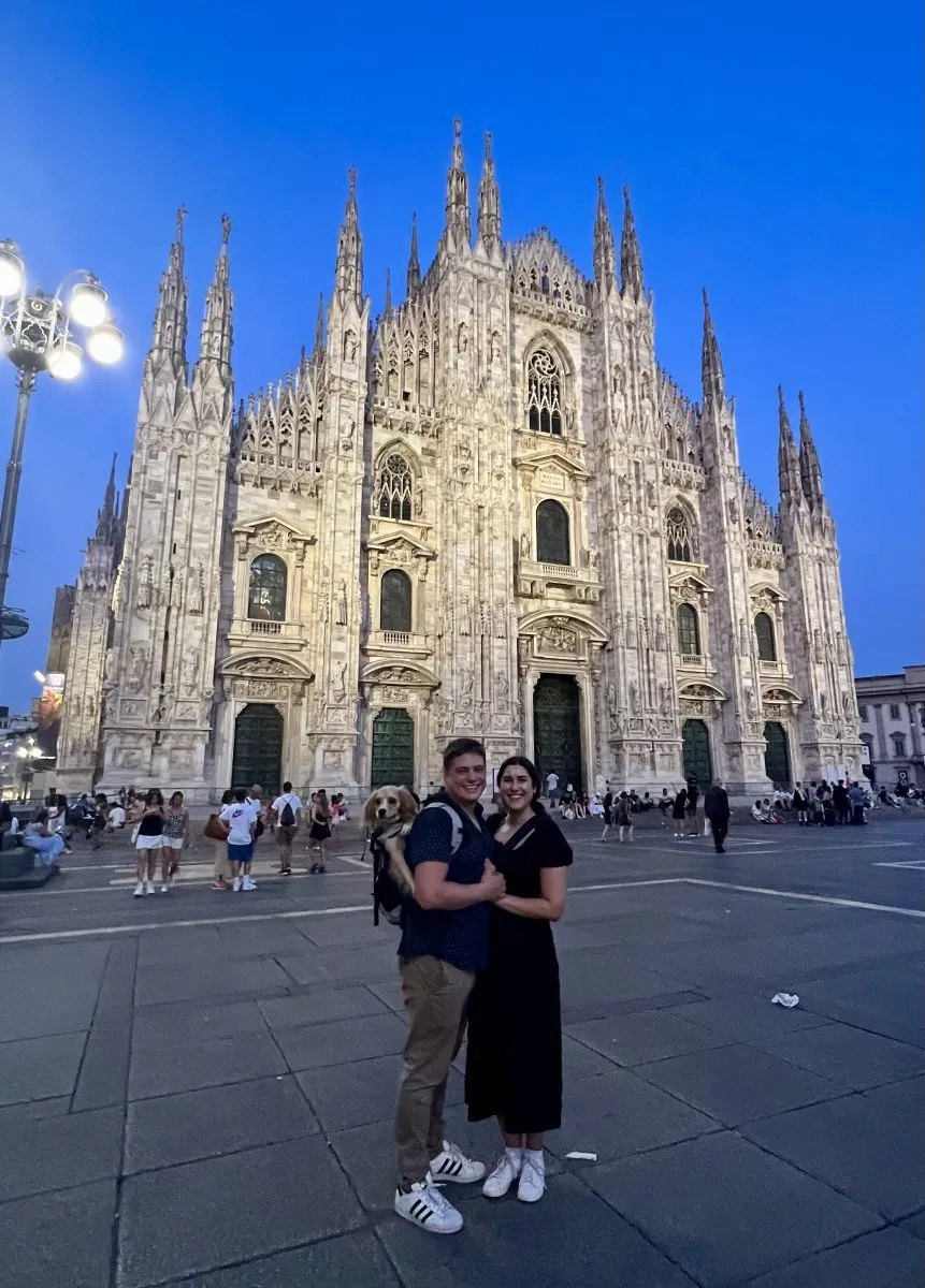 A family in Piazza del Duomo, Milan at night