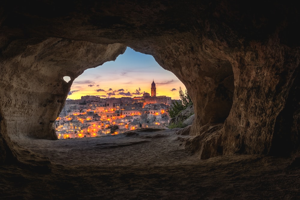 Brown cave with an overview of the city