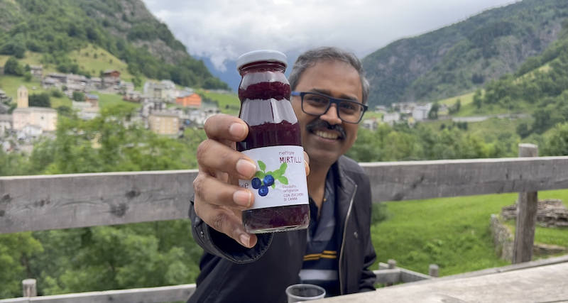 Mahesh enjoying blueberry juice on the Hanging Bridge