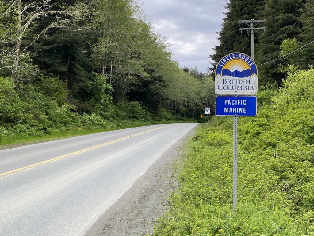 A road sign for the Pacific Marine Circle Route on Vancouver Island